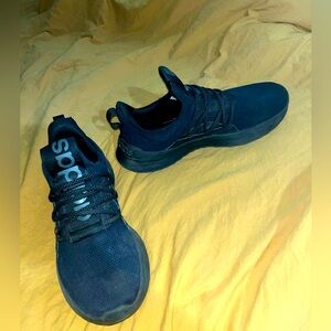 Men’s black ADIDAS TENNIS SHOES. Pull on style. Adidas strap over top.